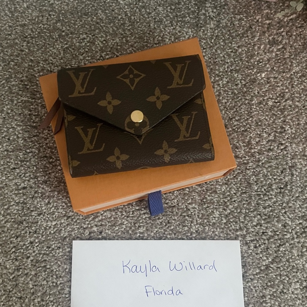 Beautiful Brand new never used Louis Vuitton Victorians Wallet.